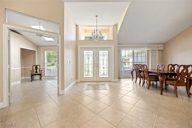 a view of a livingroom with furniture and chandelier