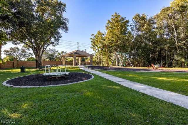 a view of a house with a big yard