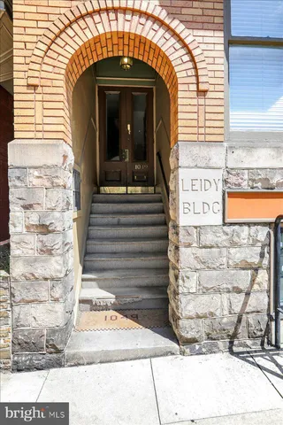 a view of entryway with a front door