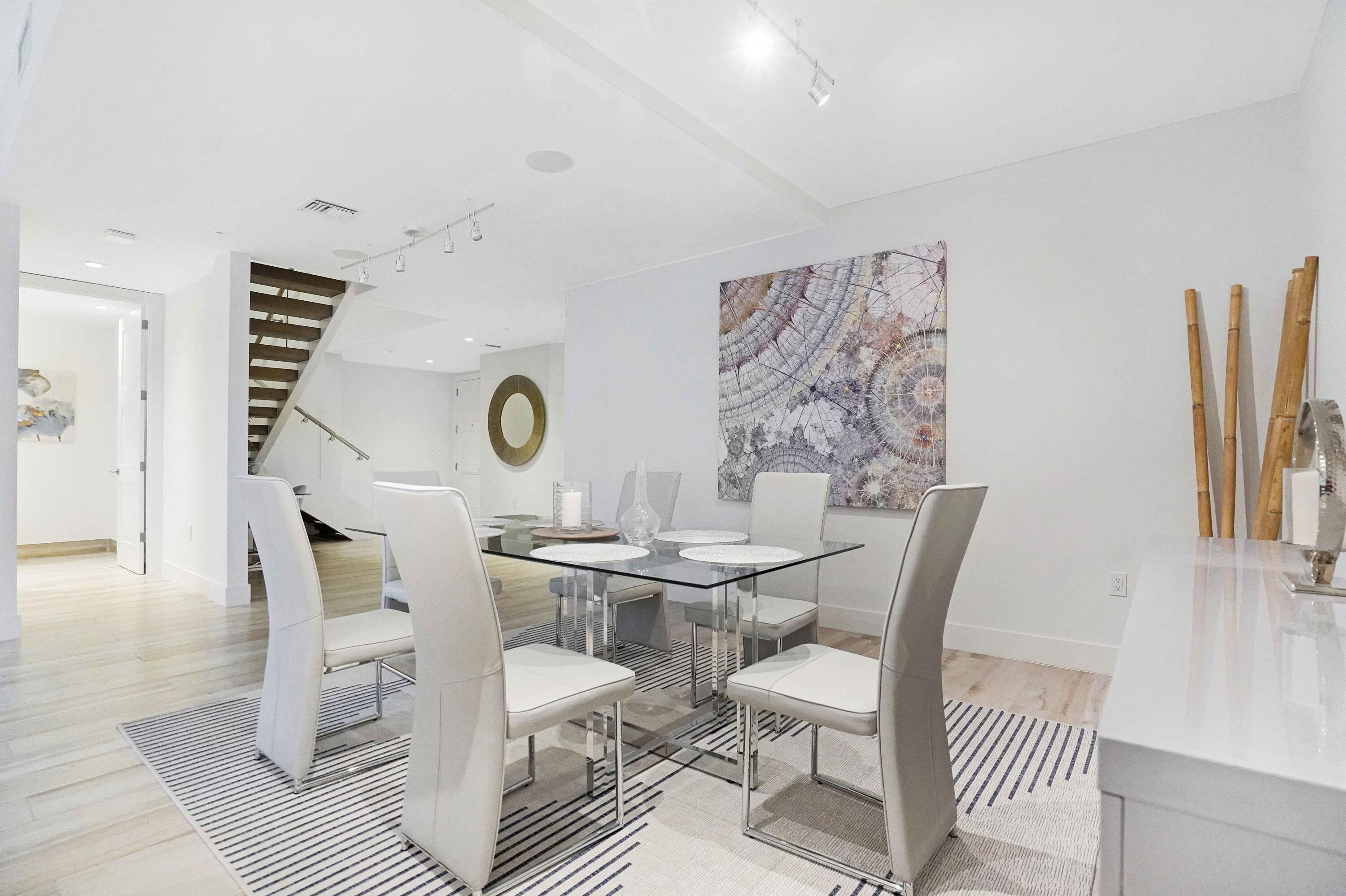 155 East Boca Raton Road, Unit TH3 Boca Raton, FL 33432 - Photo 32 of 112 a view of a dining room with furniture