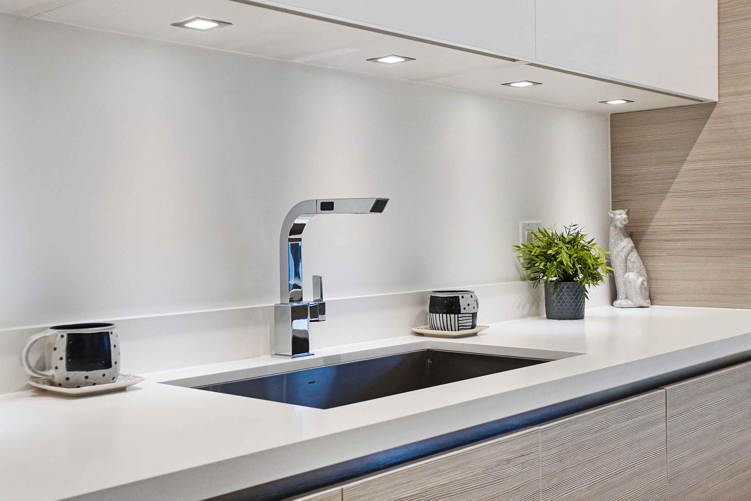 155 East Boca Raton Road, Unit TH3 Boca Raton, FL 33432 - Photo 38 of 112 a view of a kitchen with kitchen island a sink and wooden floor