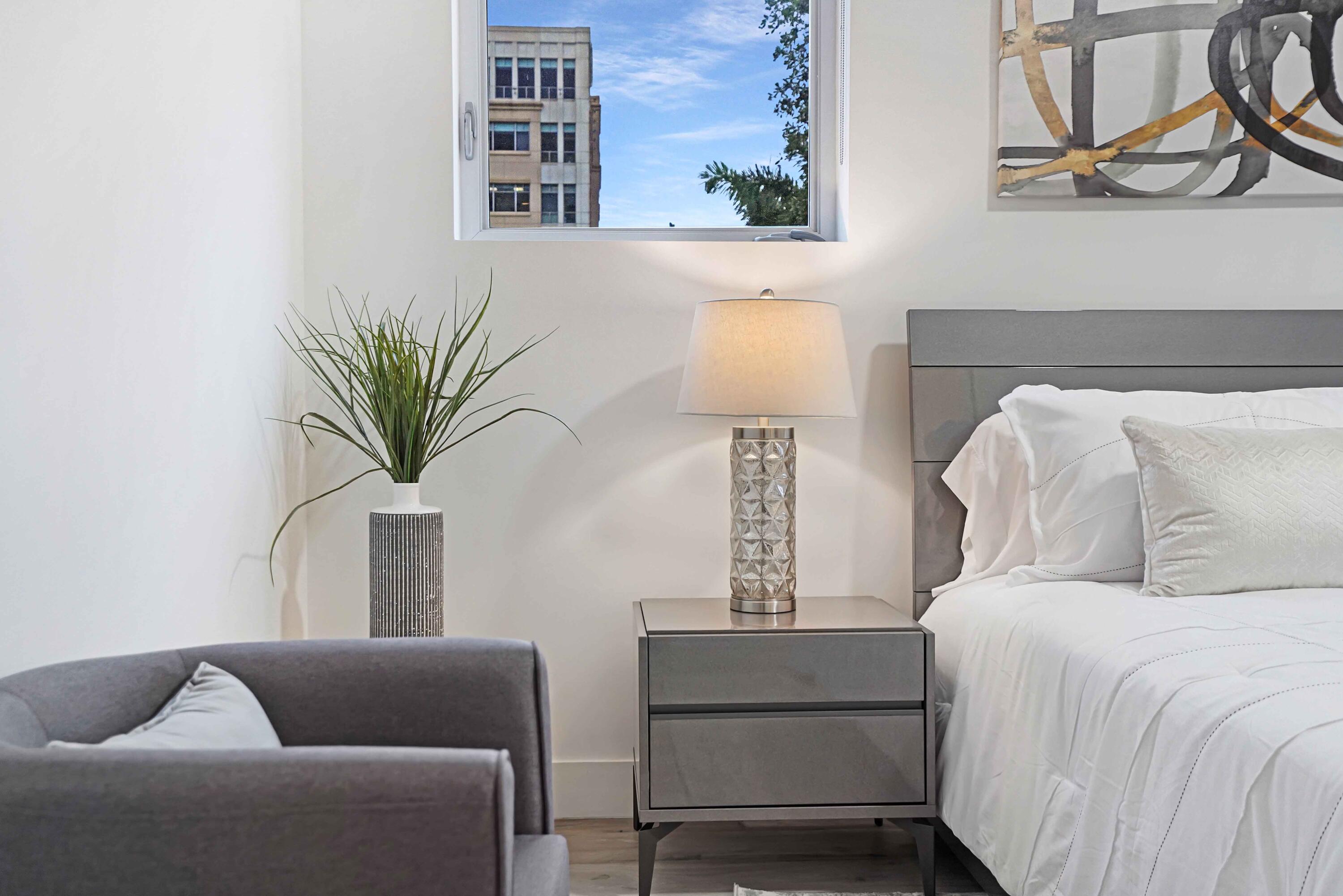 155 East Boca Raton Road, Unit TH3 Boca Raton, FL 33432 - Photo 54 of 112 a living room with furniture and a potted plant