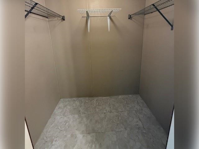 3251 E Road, Unit 11 Clifton, CO 81520 - Photo 8 of 15 a view of a room with racks on the wall