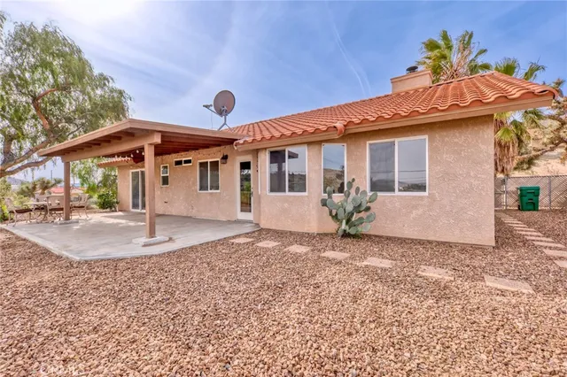 a view of a house with a patio