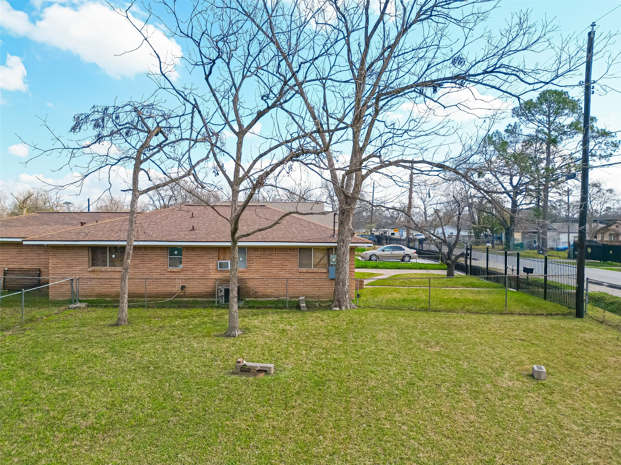 7902 Pointer Street Houston, TX 77016 - Photo 3 of 24 a view of a house with a yard