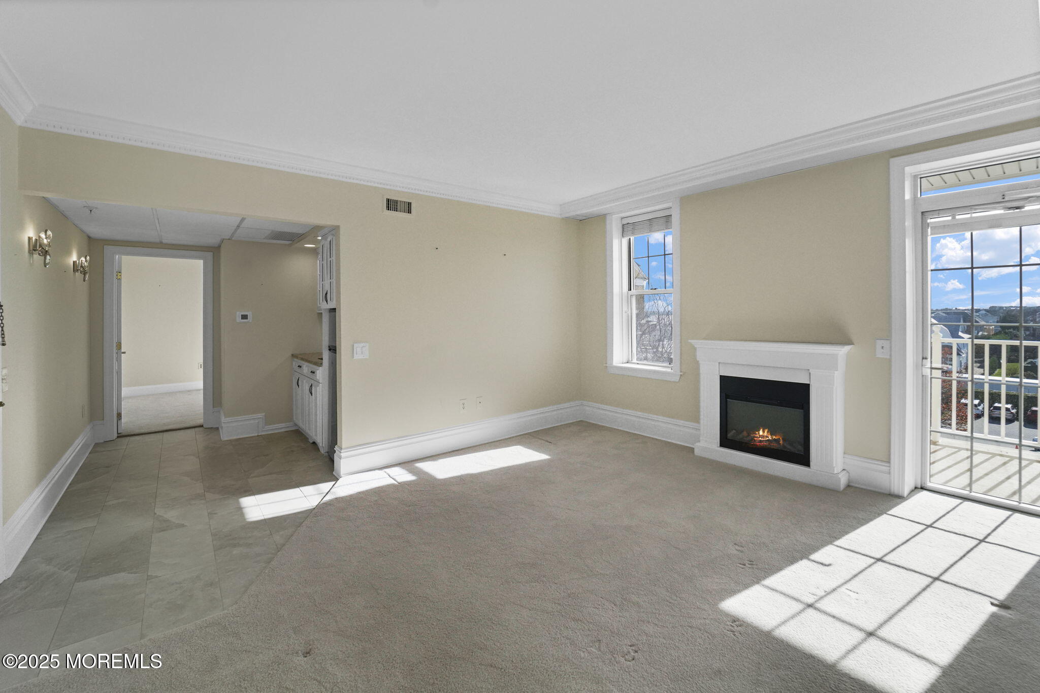 700 Ocean Avenue North, Unit 333 Spring Lake, NJ 07762 - Photo 11 of 19 a view of a livingroom with a fireplace and window