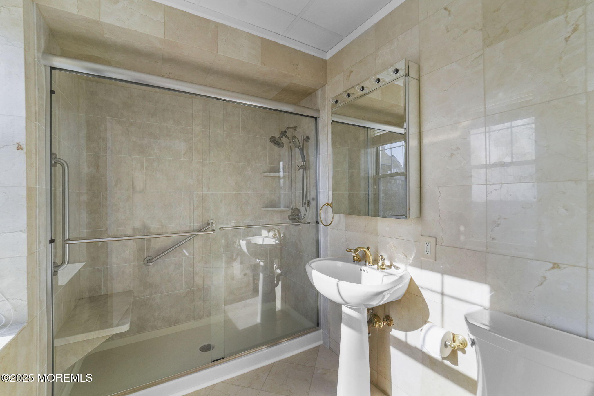 700 Ocean Avenue North, Unit 333 Spring Lake, NJ 07762 - Photo 12 of 19 a bathroom with a shower and a sink