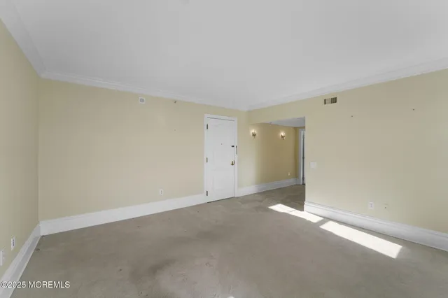 an empty room with an entryway