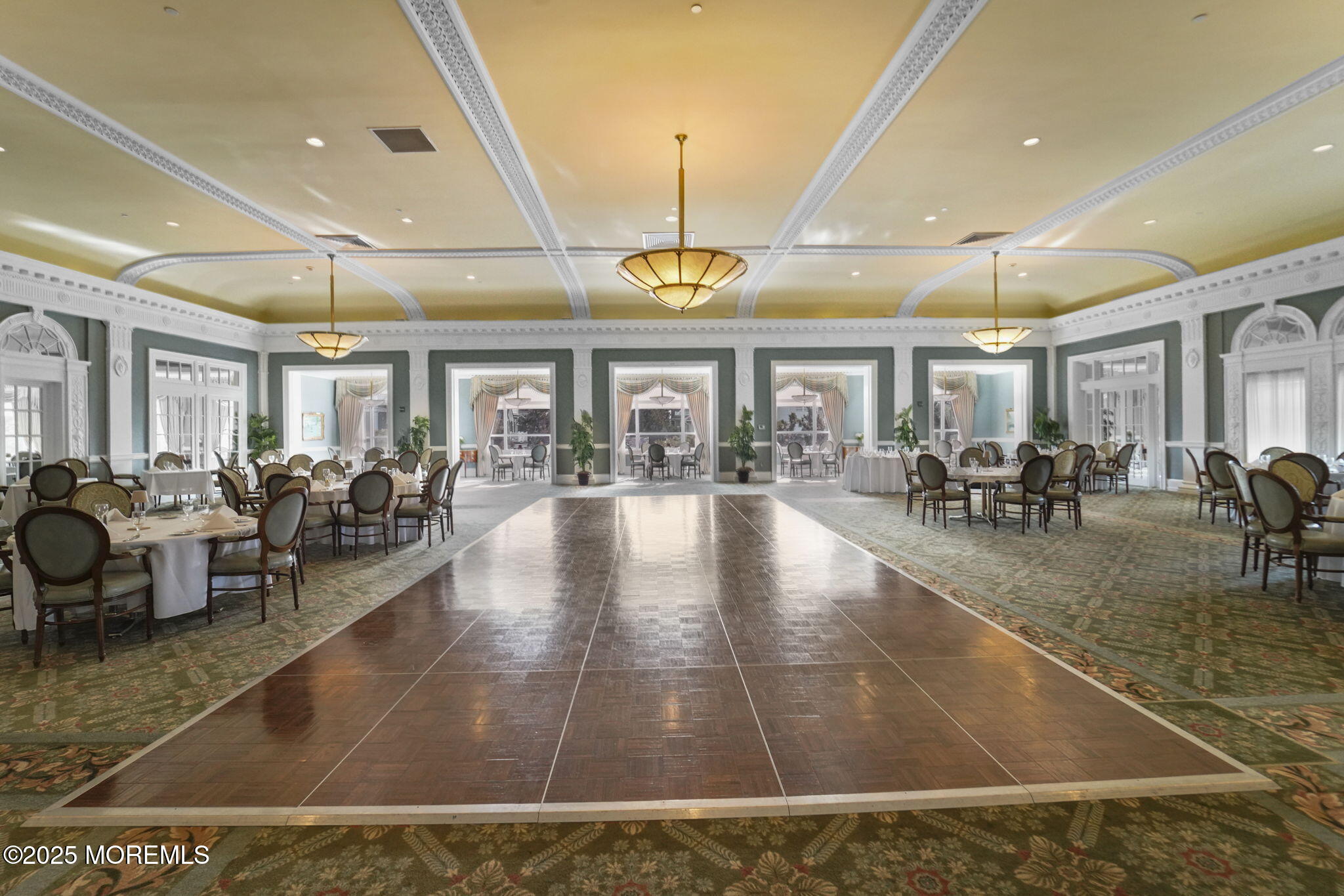 700 Ocean Avenue North, Unit 333 Spring Lake, NJ 07762 - Photo 17 of 19 a view of a dining hall with lots of tables and chairs