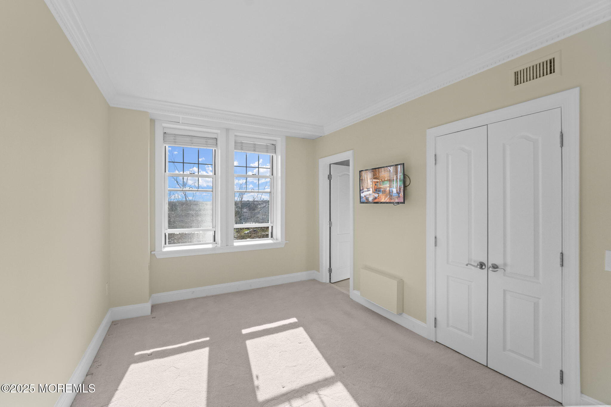 700 Ocean Avenue North, Unit 333 Spring Lake, NJ 07762 - Photo 6 of 19 a view of empty room with windows