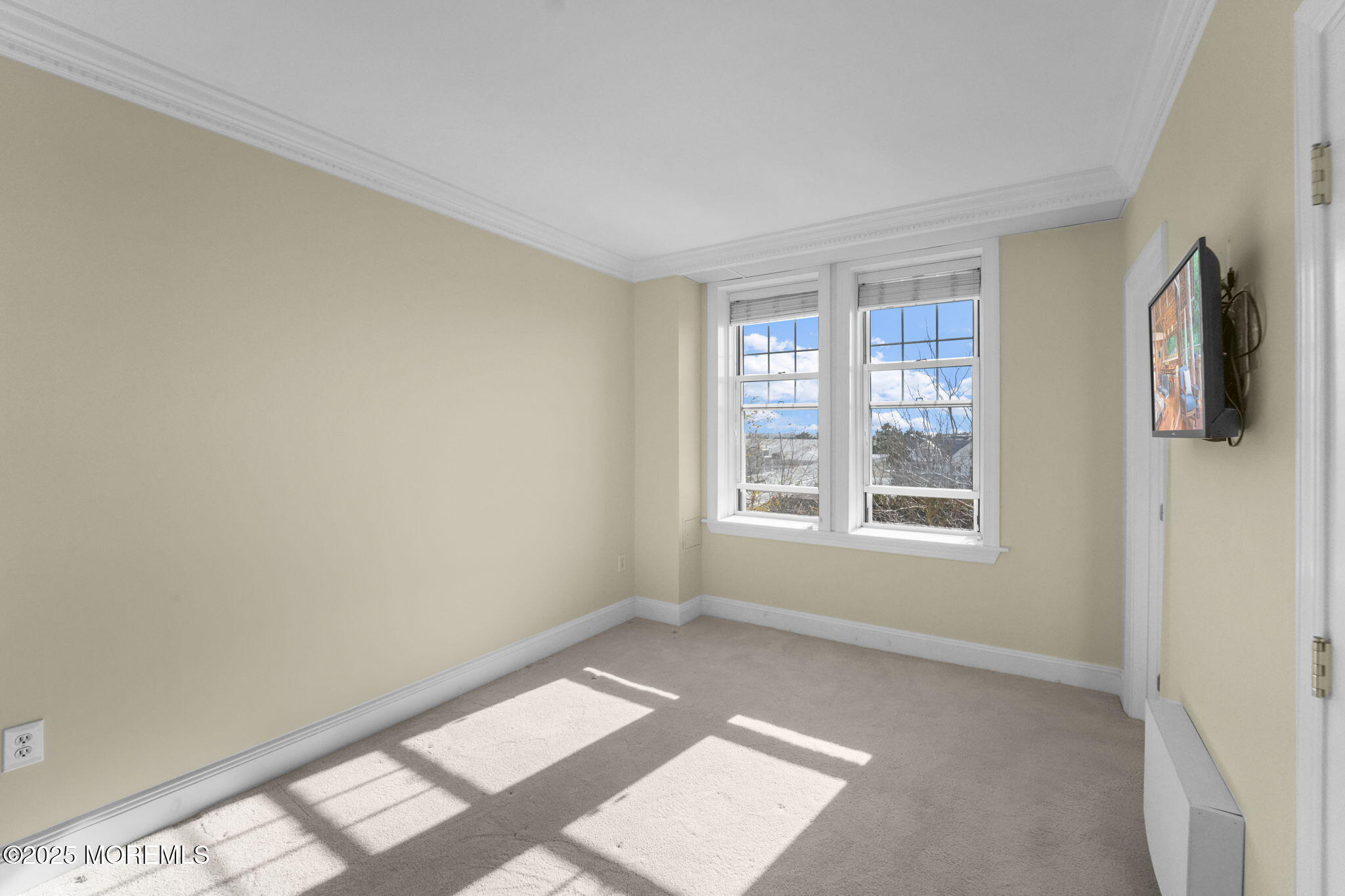 700 Ocean Avenue North, Unit 333 Spring Lake, NJ 07762 - Photo 7 of 19 a view of an empty room with a window
