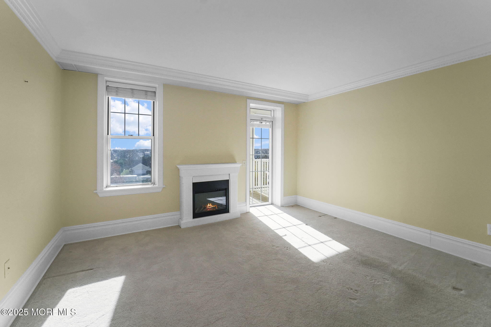 700 Ocean Avenue North, Unit 333 Spring Lake, NJ 07762 - Photo 9 of 19 a view of empty room with a fireplace