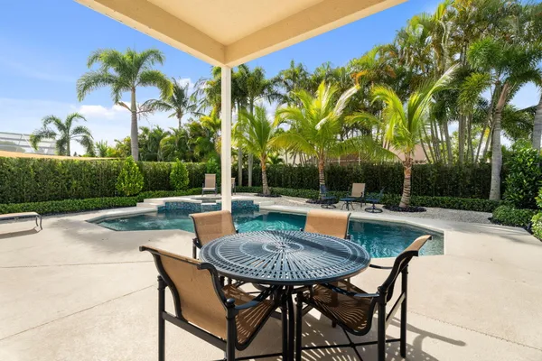 a view of swimming pool with a patio