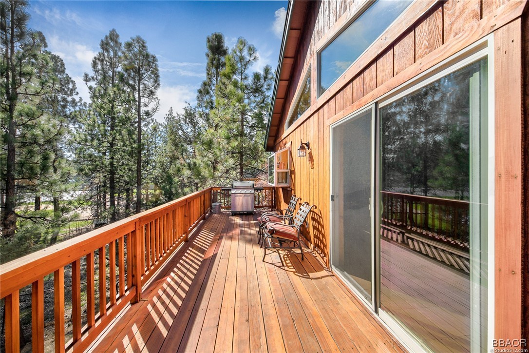 308 Eagle Drive Big Bear Lake, CA 92315 - Photo 21 of 29 a balcony with wooden floor and outdoor space