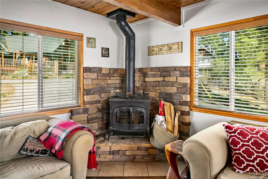 308 Eagle Drive Big Bear Lake, CA 92315 - Photo 6 of 29 a living room with furniture and a fireplace