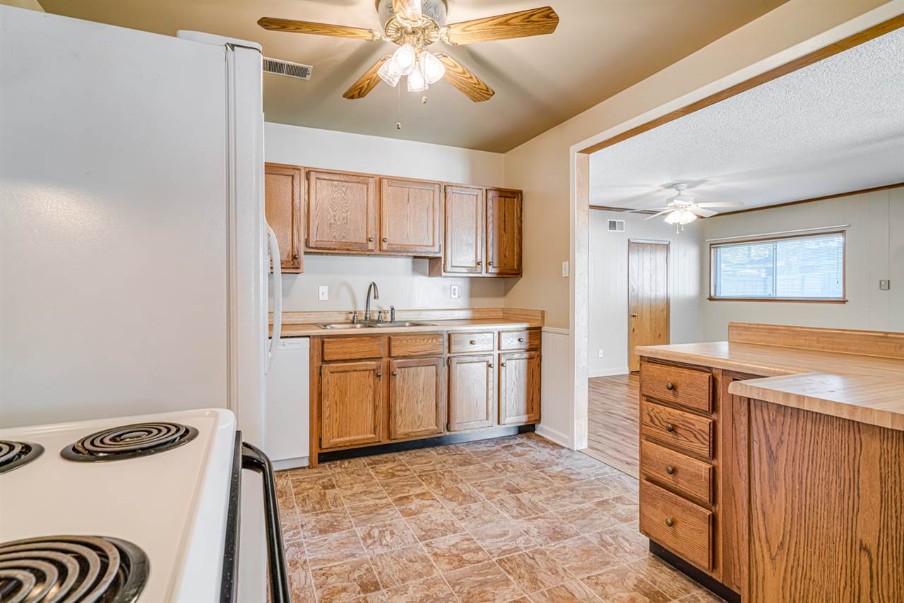 4862 Verne Road Memphis, TN 38117 - Photo 9 of 23 The kitchen and view into the den.