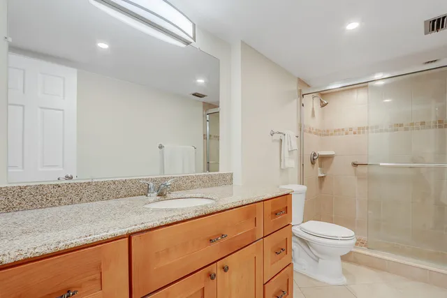 a view of a house with backyard porch and sitting area
