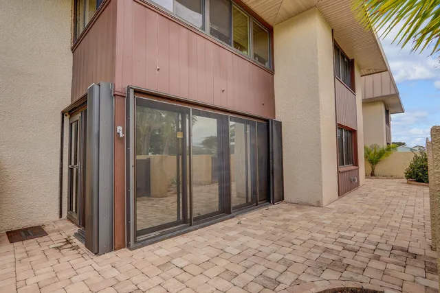a view of a terrace with sitting area