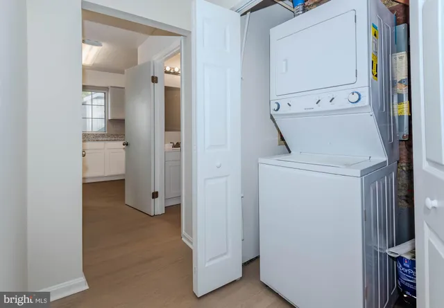 a view of a storage & utility room with utility room