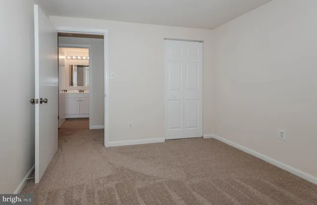 wooden floor and closet in a room