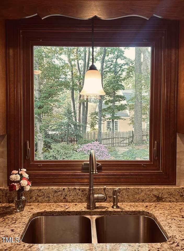 2908 Bolo Trail Raleigh, NC 27615 - Photo 14 of 41 a kitchen view with a sink and wooden floor