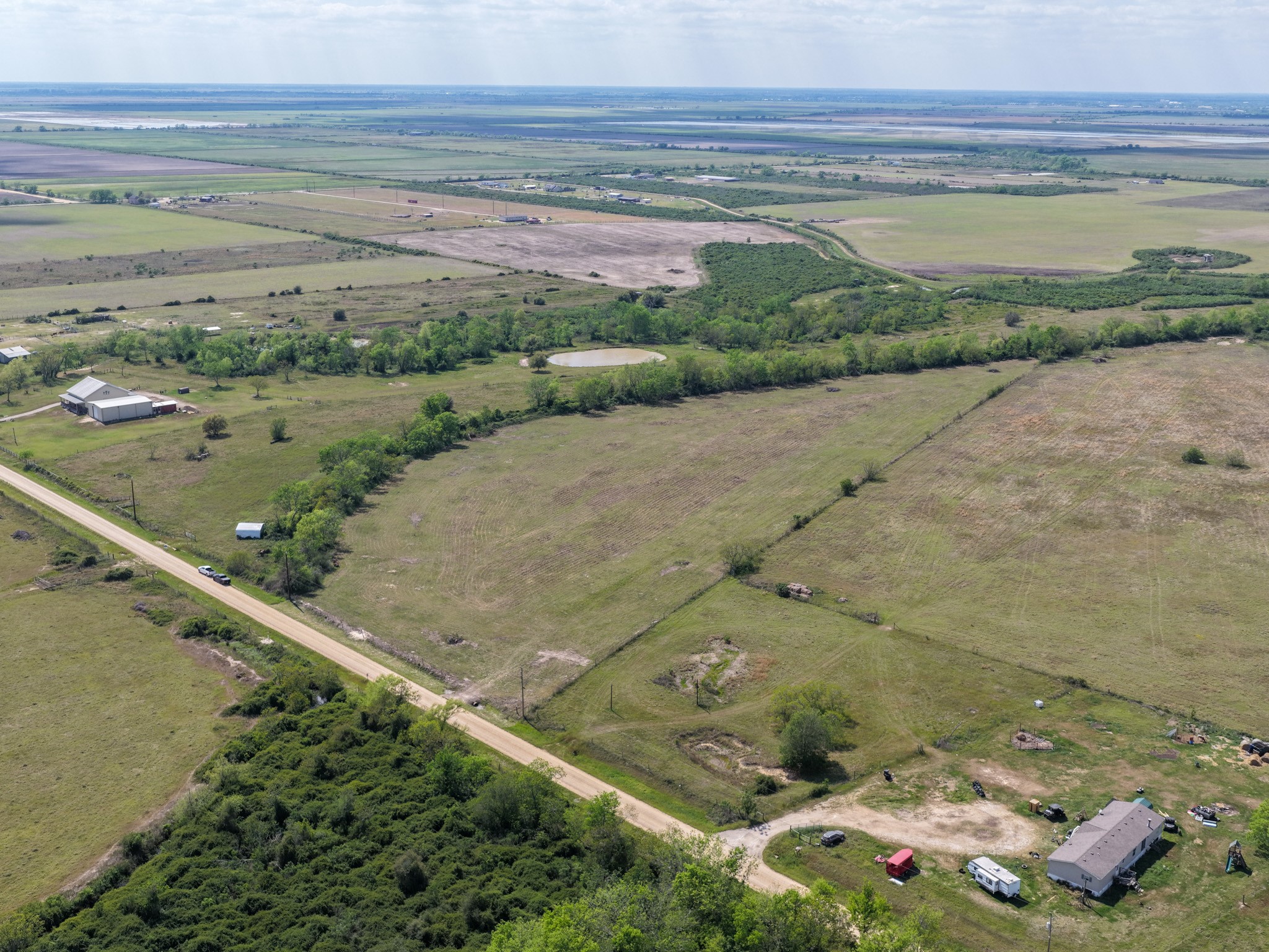 762 Cr 248 Road Lissie, TX 77454 - Photo 14 of 26 a view of a garden with an outdoor space