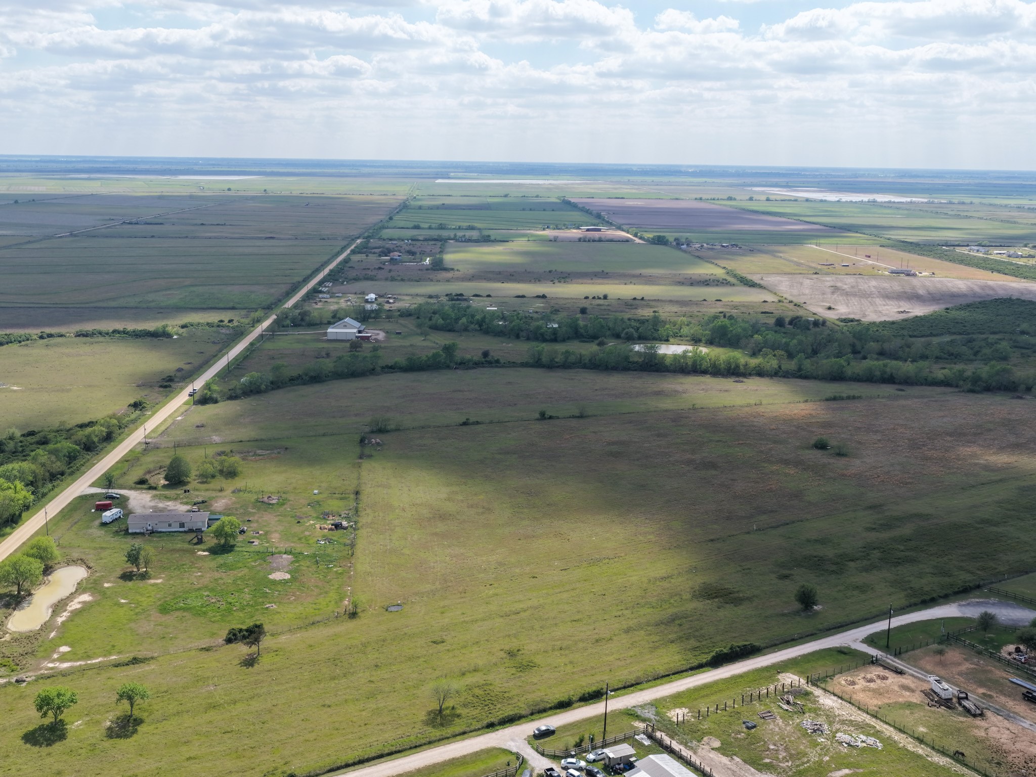 762 Cr 248 Road Lissie, TX 77454 - Photo 25 of 26 a view of an ocean from a balcony