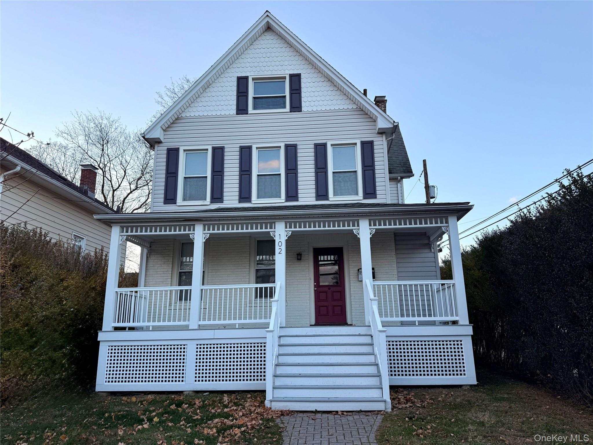 102 North Midland Avenue, Unit 2 Nyack, NY 10960 - Photo 19 of 19 a view of a brick house with many windows