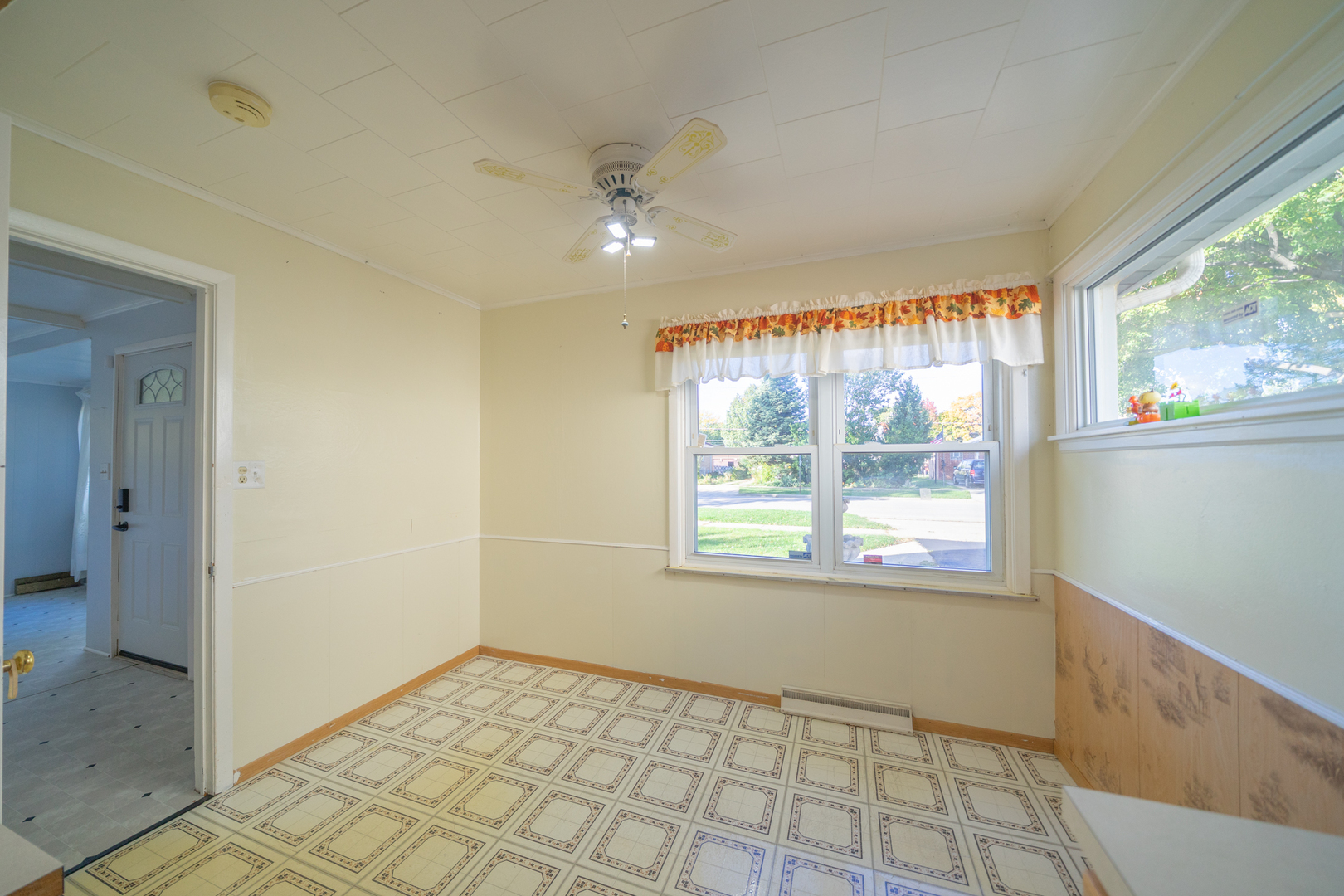 3437 Scott Street Franklin Park, IL 60131 - Photo 11 of 44 a view of an empty room and window