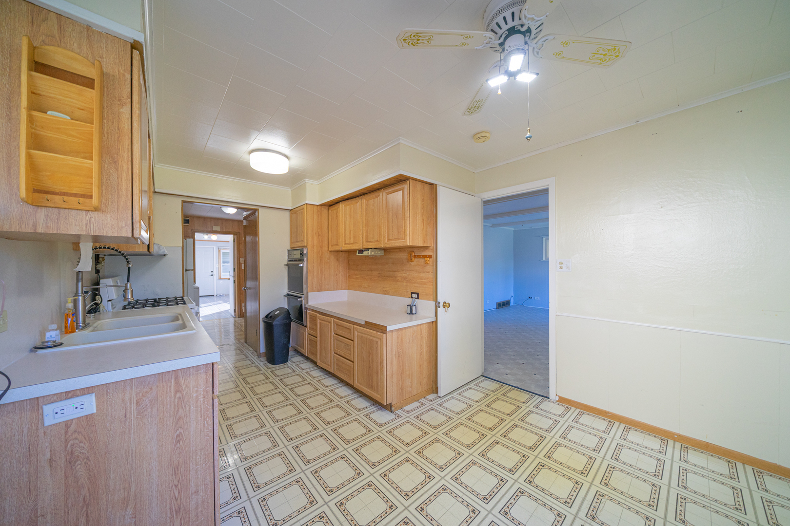 3437 Scott Street Franklin Park, IL 60131 - Photo 12 of 44 a kitchen with a cabinets and counter space
