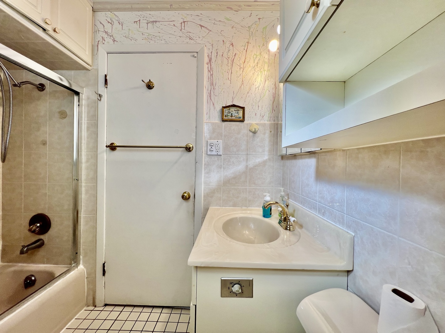 3437 Scott Street Franklin Park, IL 60131 - Photo 18 of 44 a bathroom with a sink toilet and shower