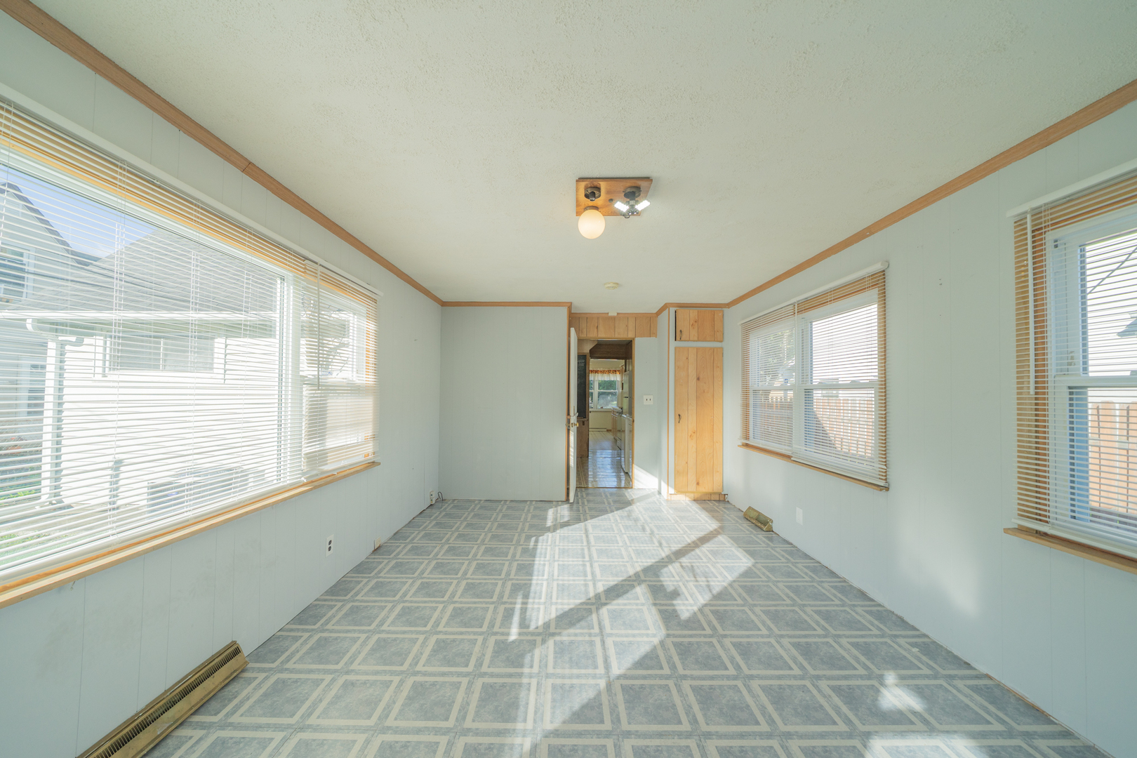 3437 Scott Street Franklin Park, IL 60131 - Photo 19 of 44 a view of an empty room with a window
