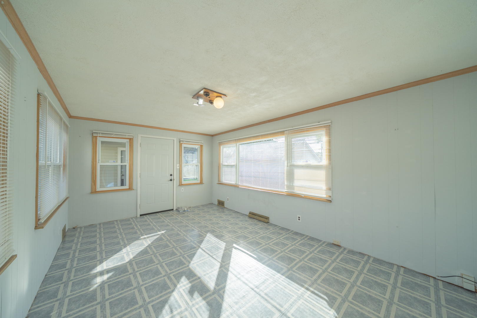 3437 Scott Street Franklin Park, IL 60131 - Photo 21 of 44 a view of an empty room with a window