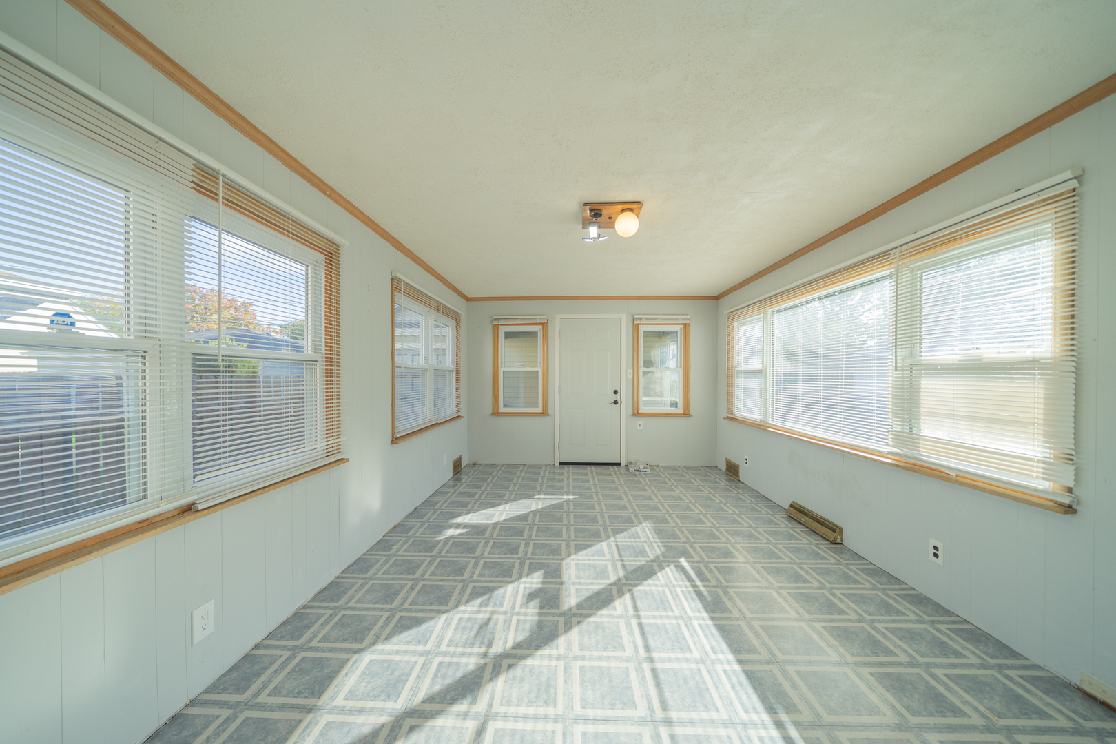 3437 Scott Street Franklin Park, IL 60131 - Photo 22 of 44 a view of an empty room with a window
