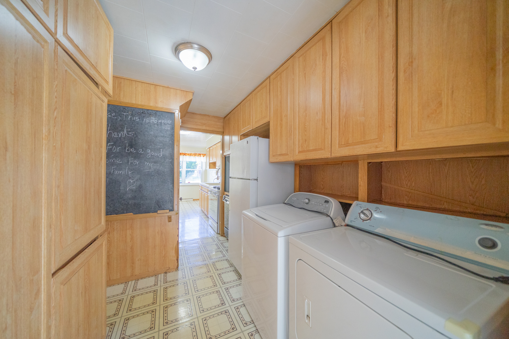 3437 Scott Street Franklin Park, IL 60131 - Photo 24 of 44 a view of storage and utility room with washer and dryer
