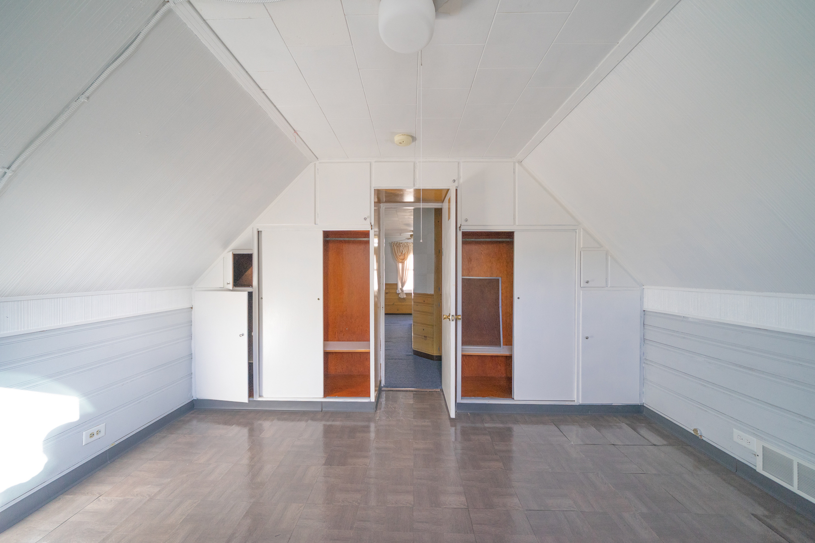 3437 Scott Street Franklin Park, IL 60131 - Photo 28 of 44 wooden floor in an empty room with windows and entrance