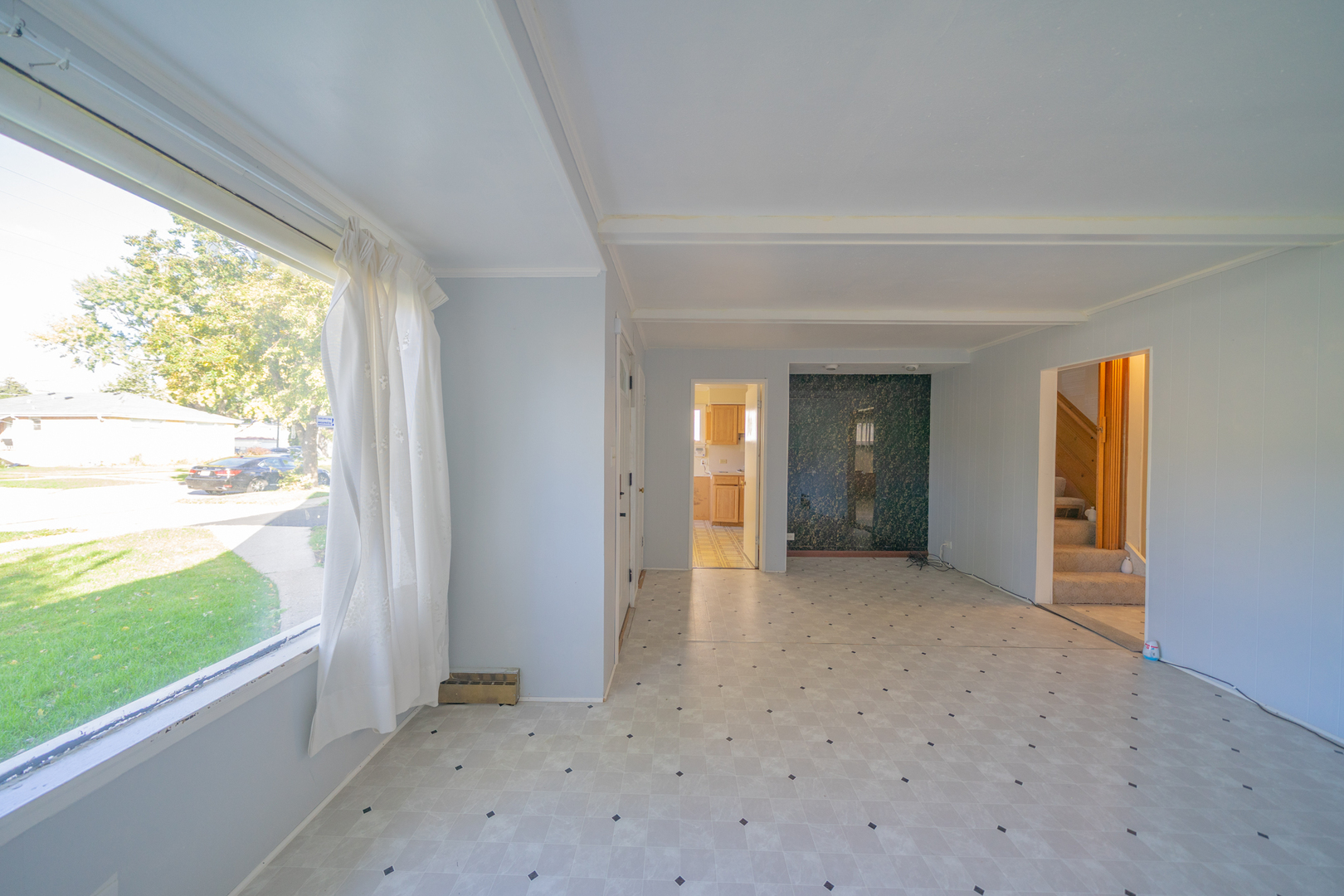 3437 Scott Street Franklin Park, IL 60131 - Photo 3 of 44 a view of an empty room and window