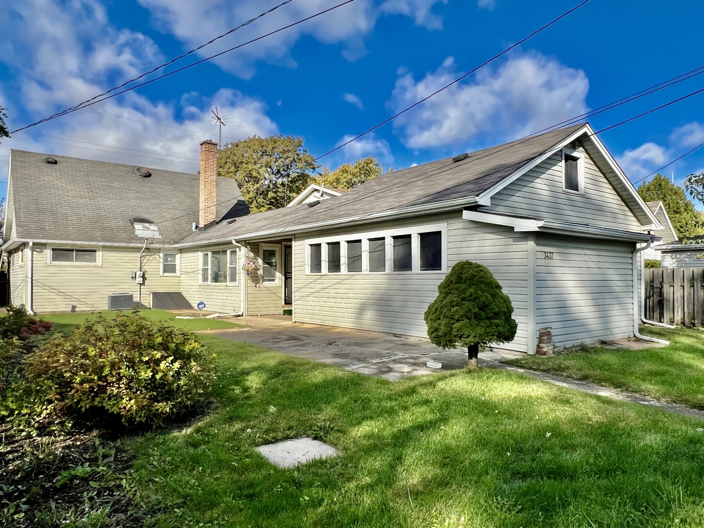 3437 Scott Street Franklin Park, IL 60131 - Photo 36 of 44 a view of a house with a yard and sitting area
