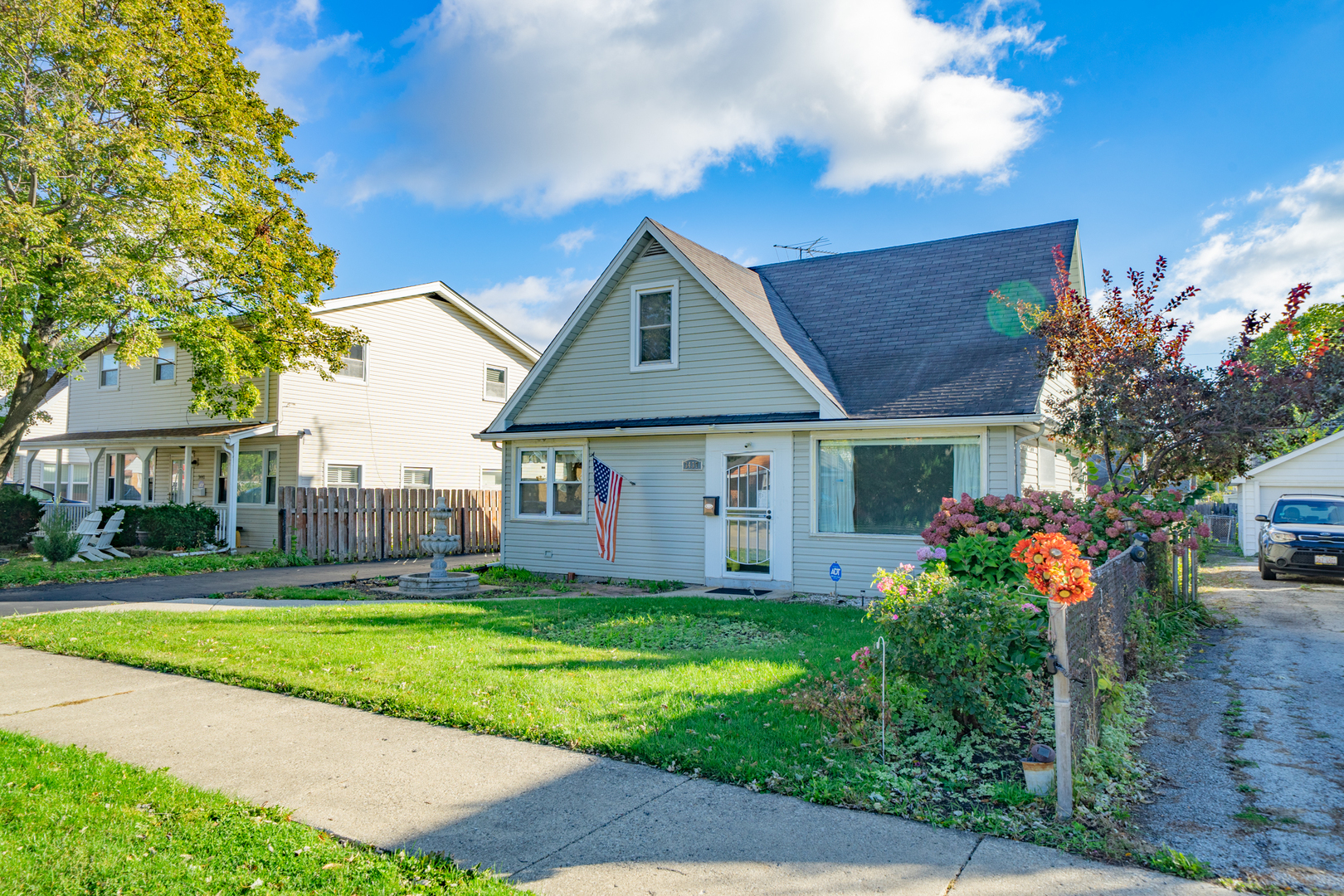 3437 Scott Street Franklin Park, IL 60131 - Photo 44 of 44 a front view of a house with a yard and trees