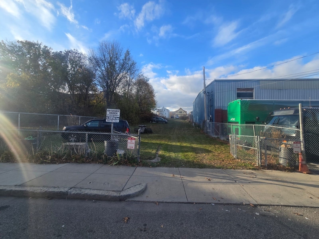 51 Ceylon Street Boston, MA 02121 - Photo 2 of 18 a view of backyard with green space