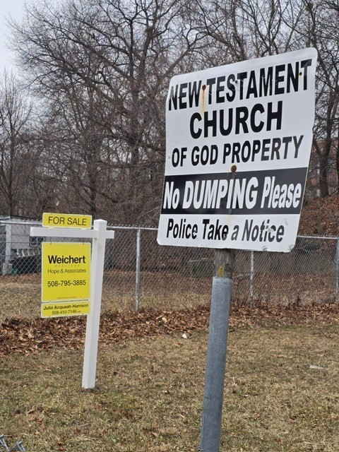 51 Ceylon Street Boston, MA 02121 - Photo 5 of 18 a sign broad on the side of the road