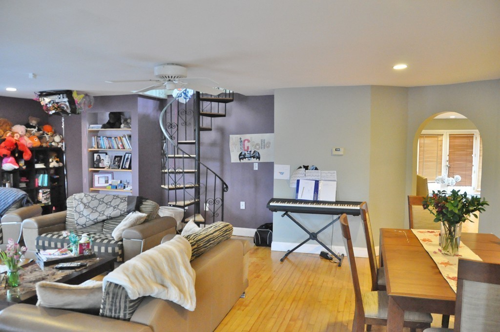 8-10 Bennington Street Newton, MA 02458 - Photo 13 of 22 a bedroom with furniture and a bed