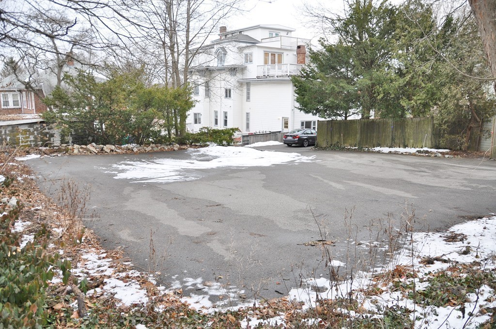 8-10 Bennington Street Newton, MA 02458 - Photo 4 of 22 a view of a road with a building in the background