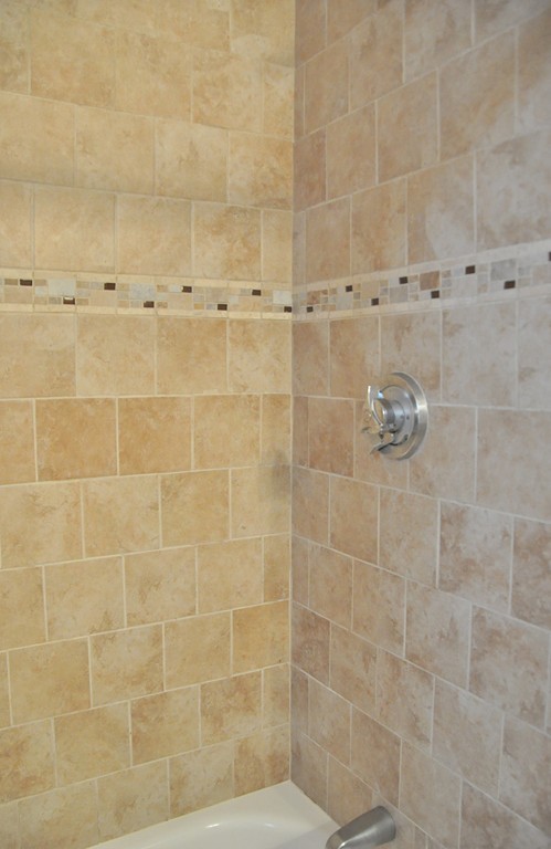 8-10 Bennington Street Newton, MA 02458 - Photo 8 of 22 a bathroom with a shower
