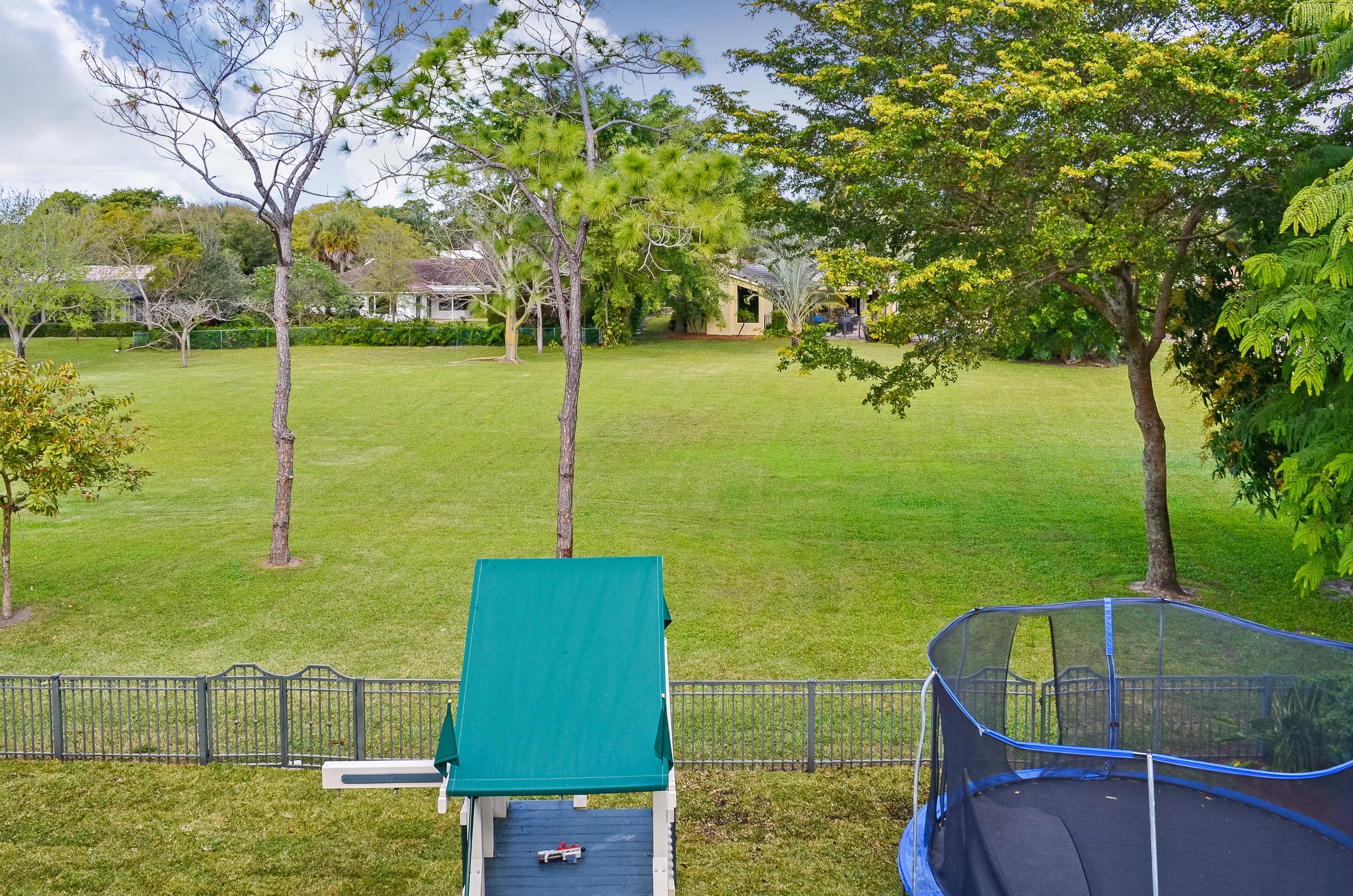 2121 Northwest 30th Road Boca Raton, FL 33431 - Photo 22 of 37 Backyard and park