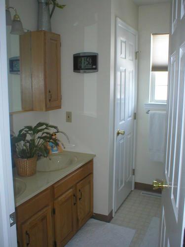 1010 Renaldi Road Wind Gap, PA 18091 - Photo 11 of 11 a bathroom with a granite countertop sink and a mirror