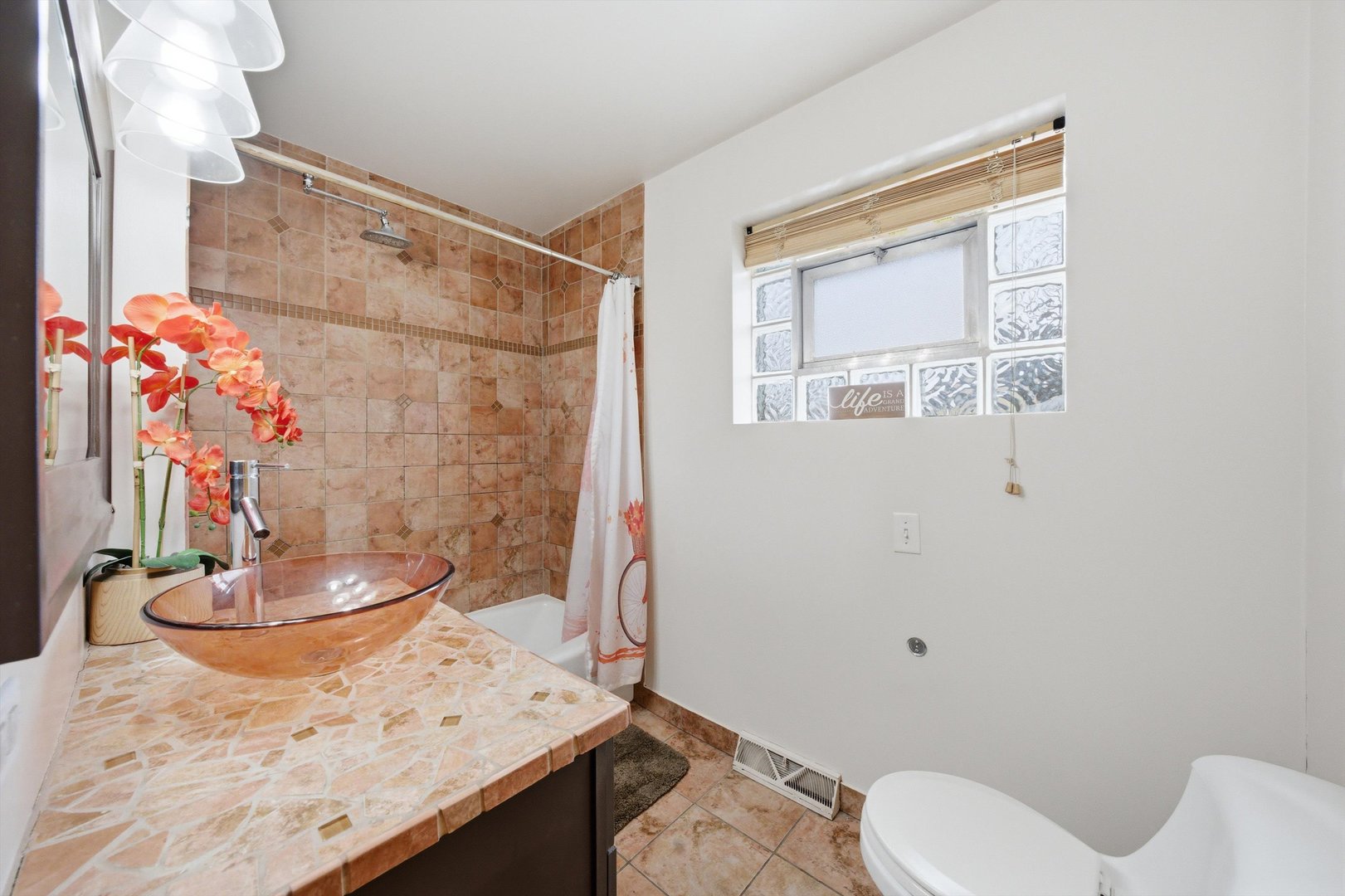 3701 West 80th Street Chicago, IL 60652 - Photo 13 of 34 a bathroom with a sink a toilet and shower