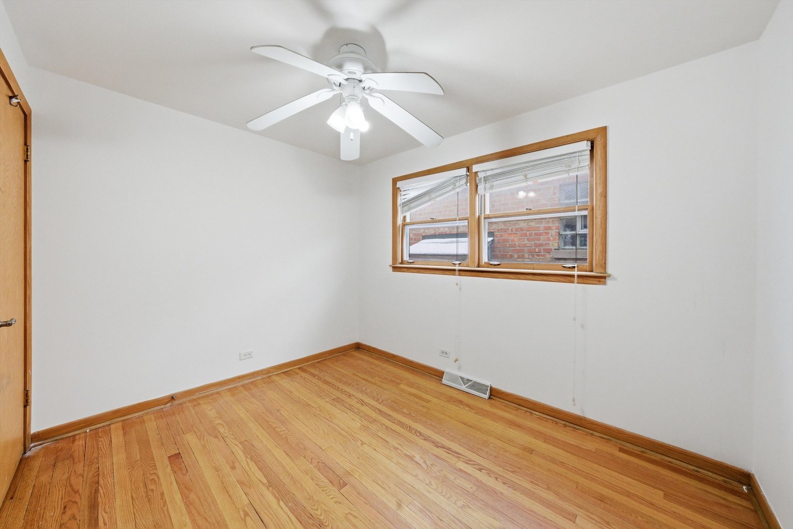 3701 West 80th Street Chicago, IL 60652 - Photo 17 of 34 a view of empty room with wooden floor