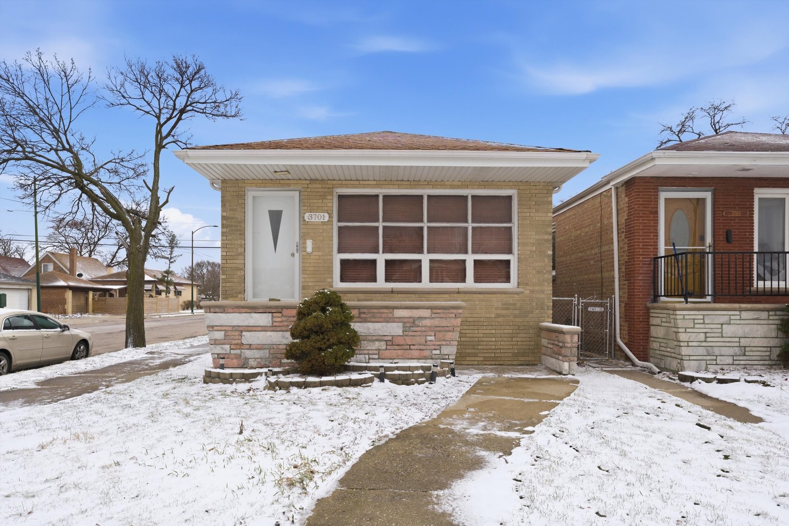 3701 West 80th Street Chicago, IL 60652 - Photo 2 of 34 a front view of a house with a yard and garage
