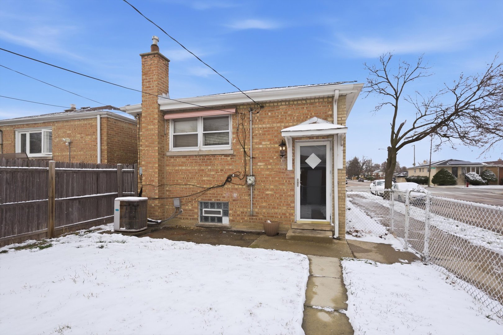 3701 West 80th Street Chicago, IL 60652 - Photo 26 of 34 a front view of a house with parking